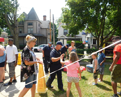 A community meeting where diverse voices share stories about law enforcement bias.