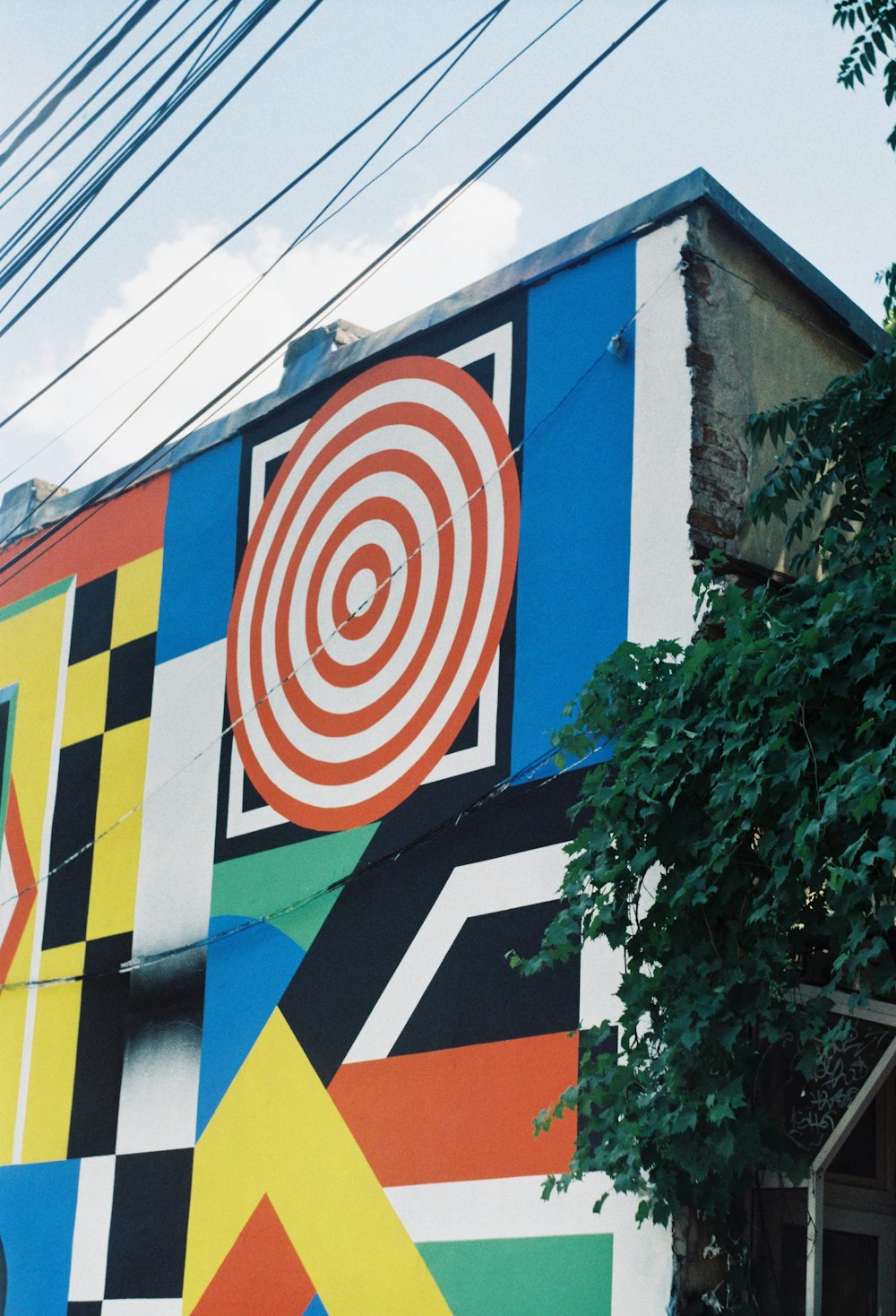 a building with a colorful mural on the side of it