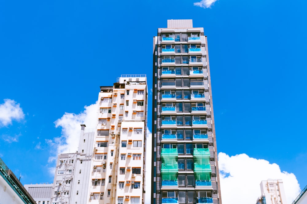 white and blue high-rise buildings