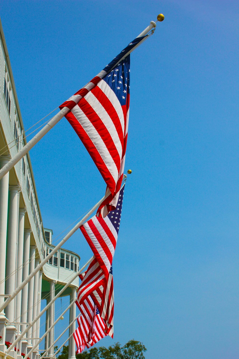 two USA flags close-up photography