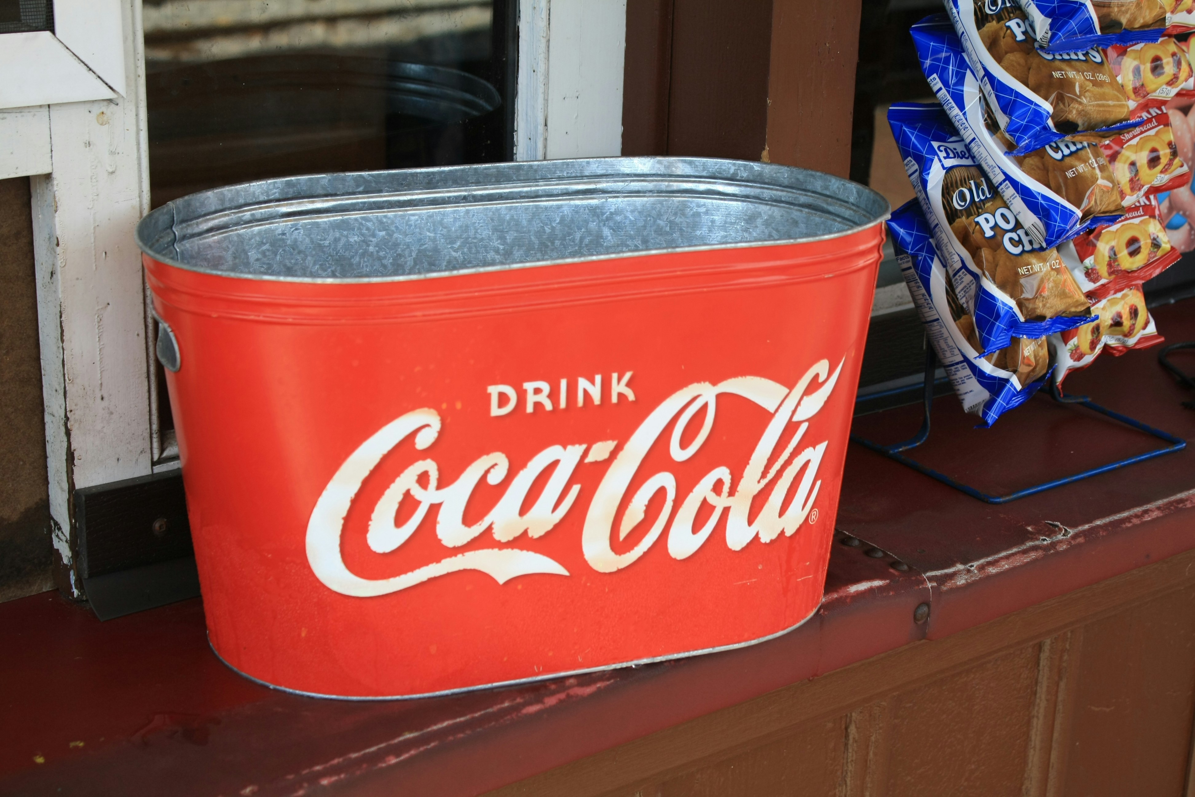 red and white Drink Coca-Cola can