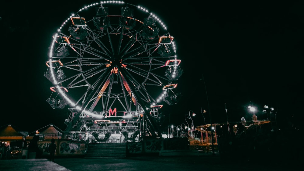 black Ferris wheel during nighttime