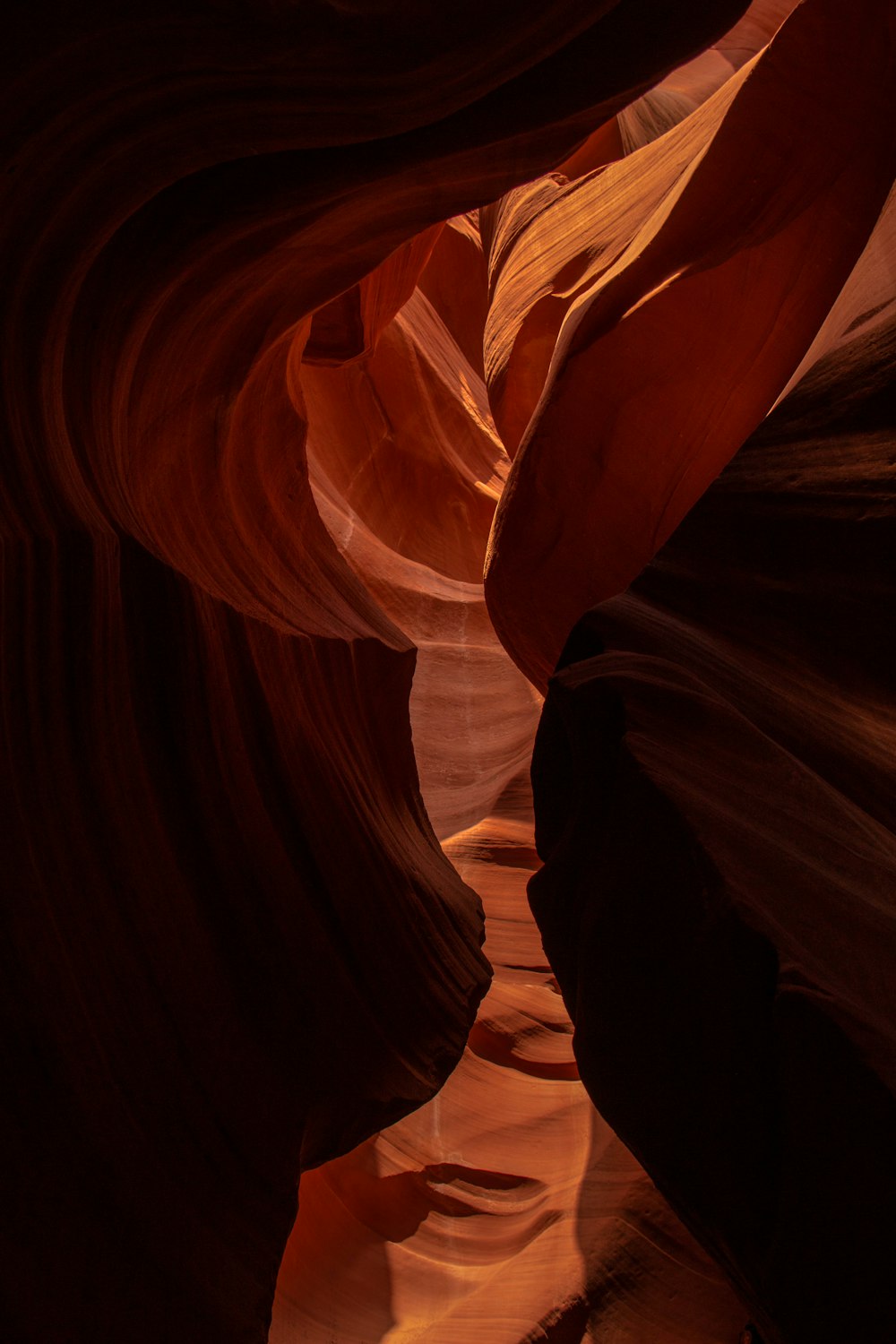 a narrow slot in the side of a canyon