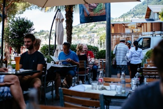Customers enjoying their meals on the outdoor terrace.