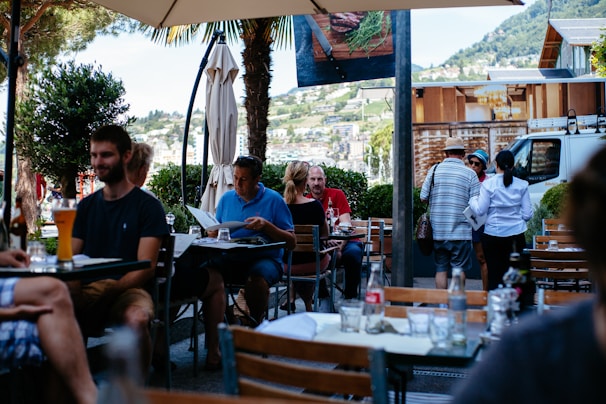 Customers enjoying their meals on the outdoor terrace.