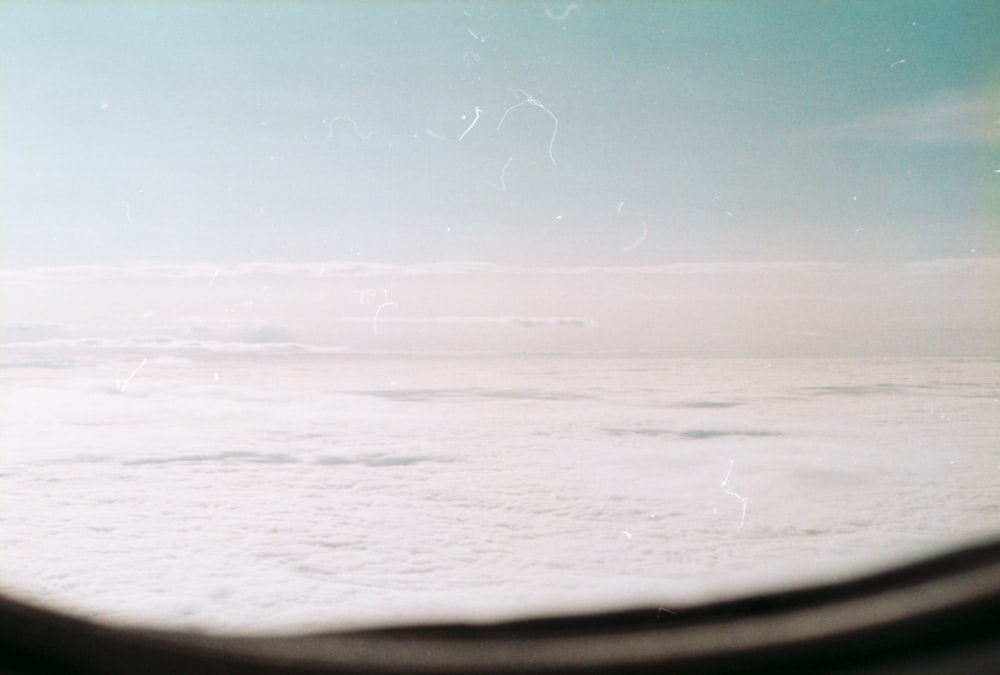 a view of the clouds from an airplane window