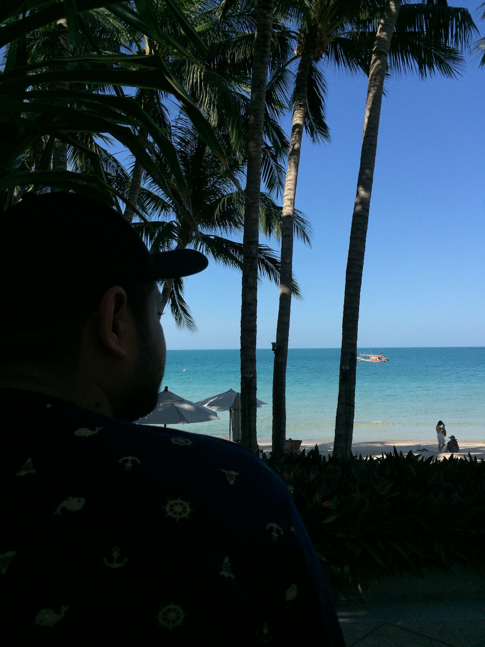 man looking at sea