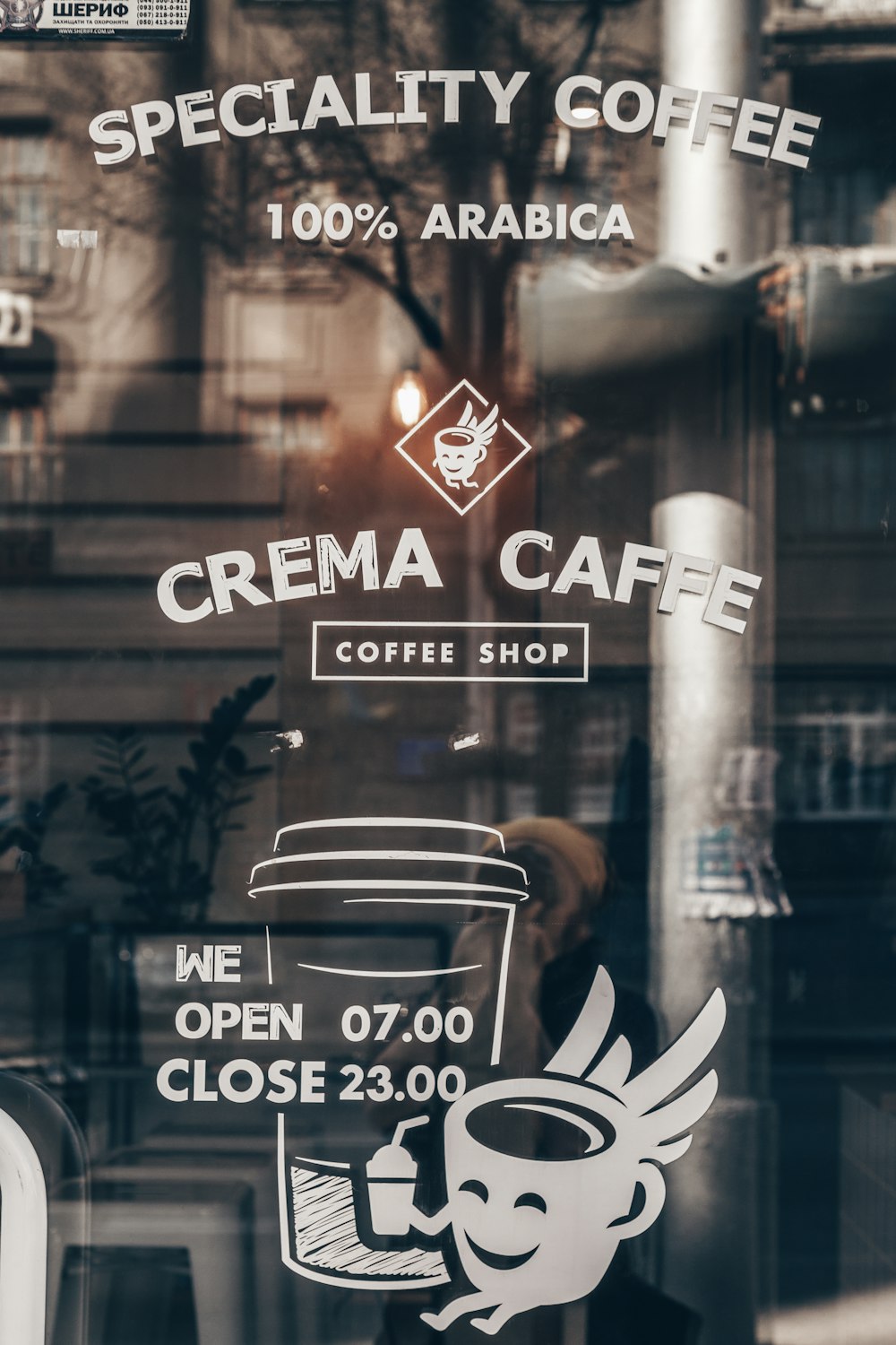 Speciality Coffee text on glass panel
