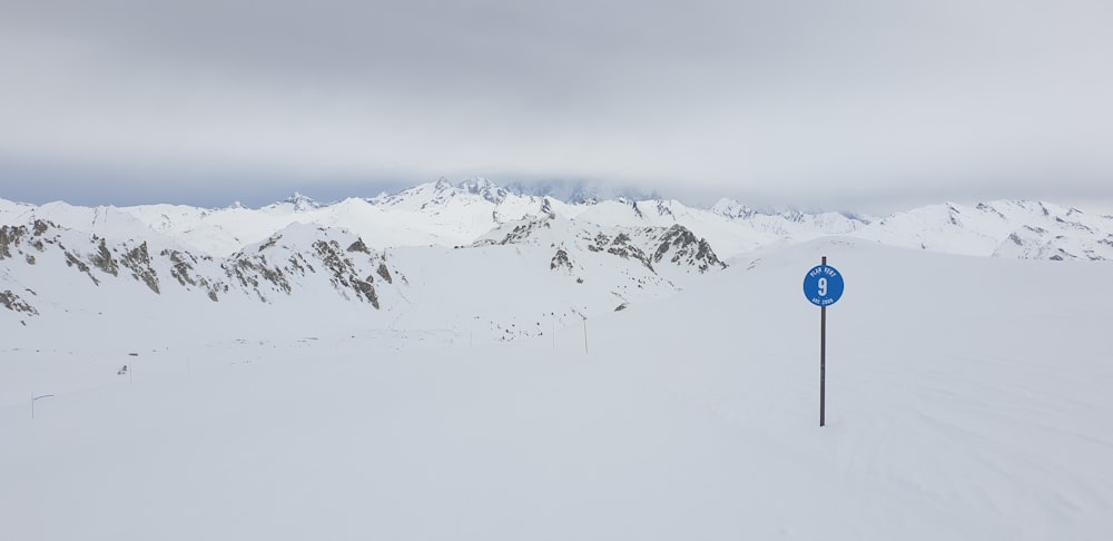 photography of snow-covered field during daytime