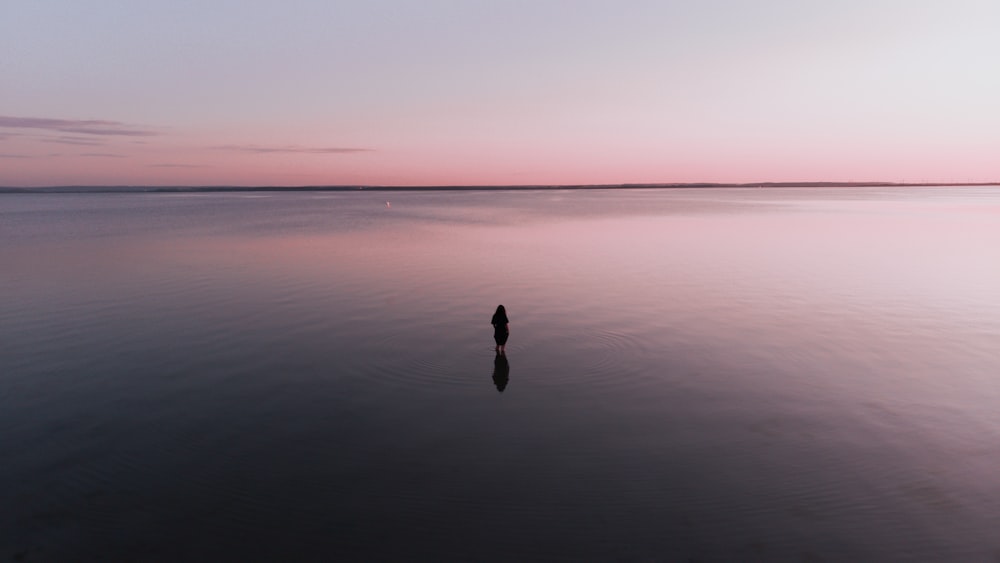 persons standing on shore