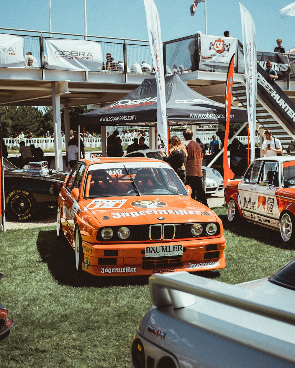 parked orange BMW sedan