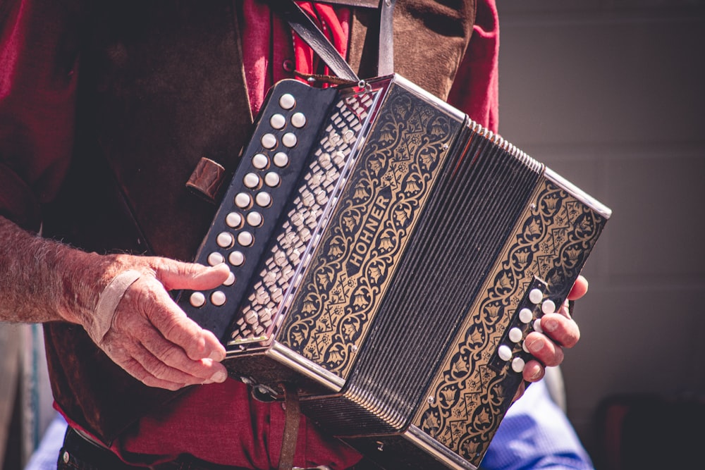 person carrying accordion