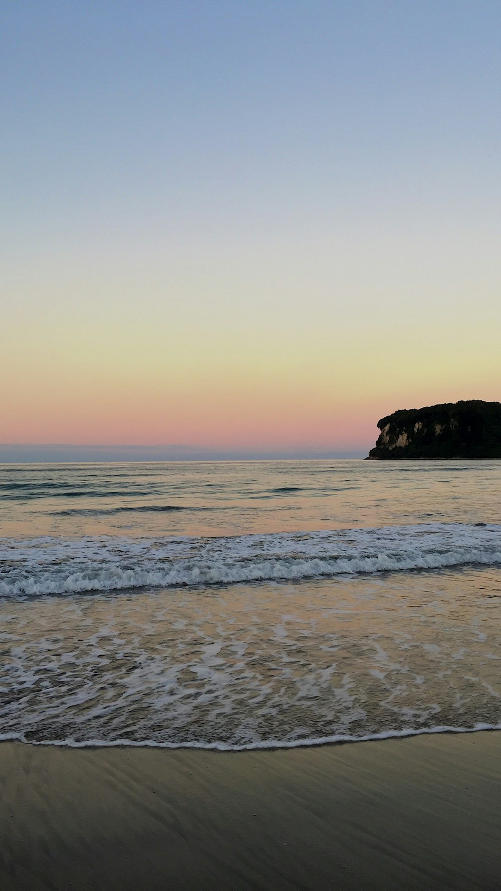 ocean waves during golden hour