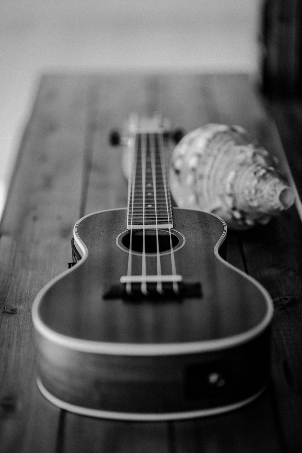 grayscale photography of ukulele