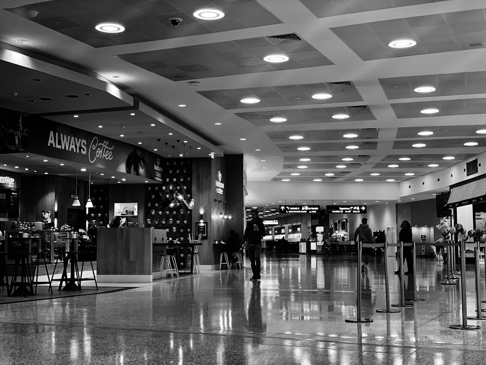 a black and white photo of a lobby