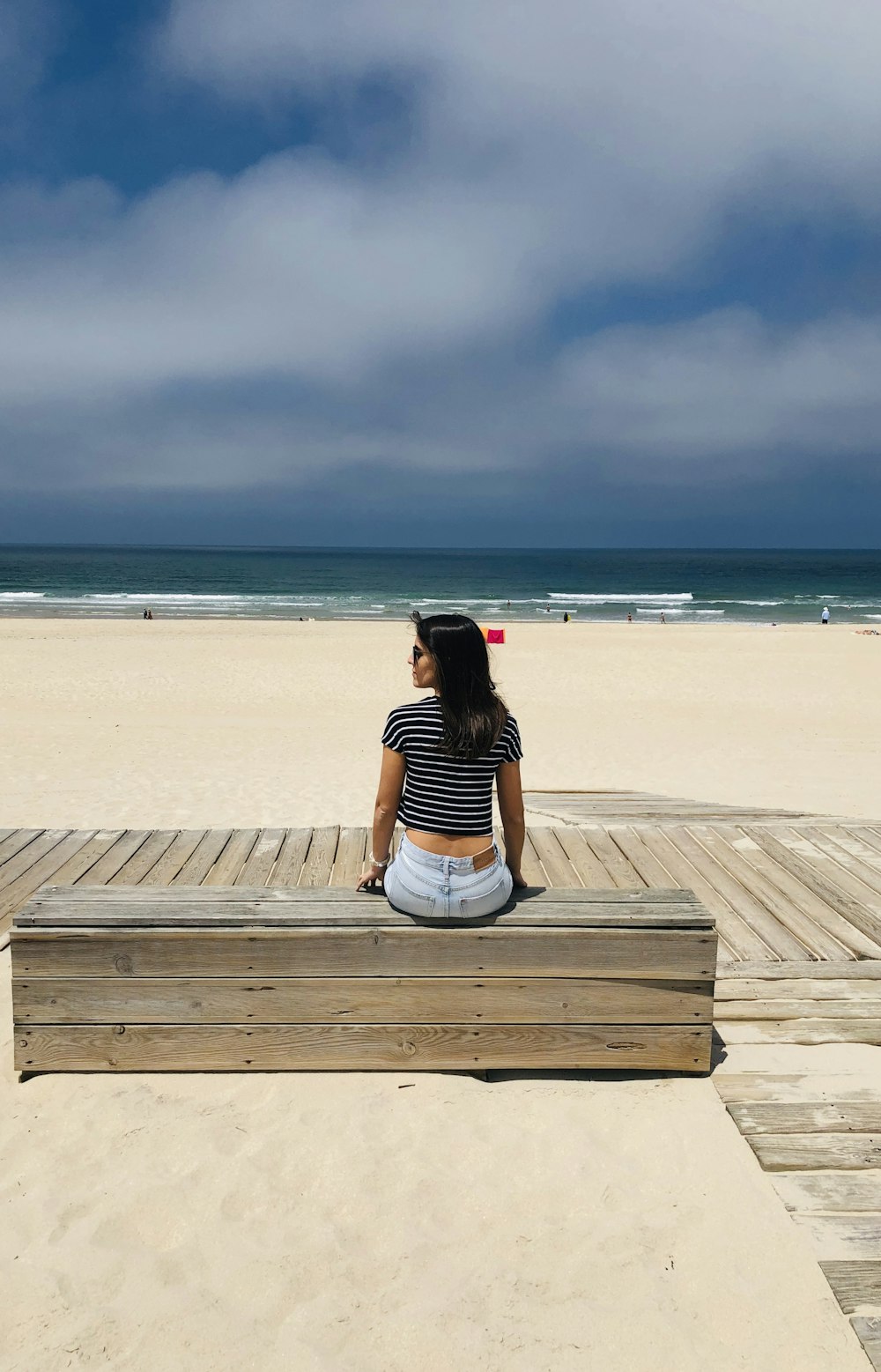 woman sitting on bench