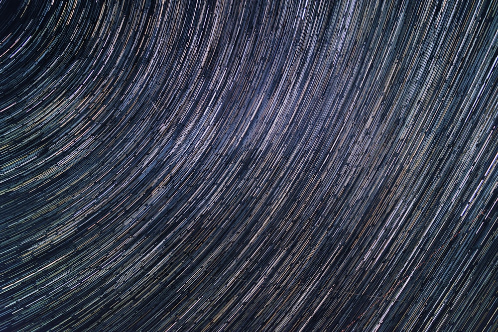 a star trail is seen in the night sky