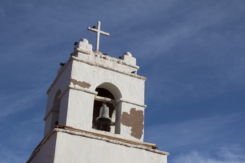 bell tower with cross