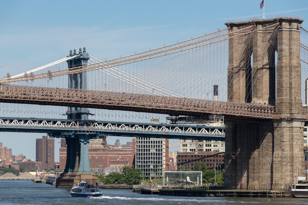 Brooklyn Bridge under blue sky