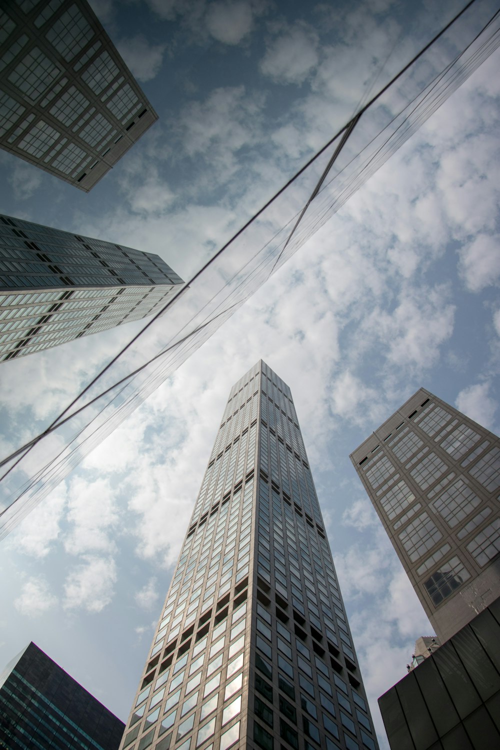 low-angle photography of high rise buildings