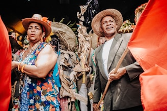 A vibrant scene showcasing a couple at a themed event.