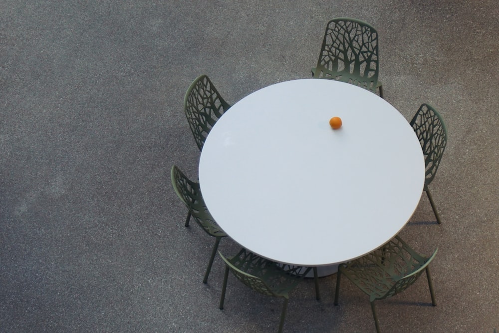 an overhead view of a table and chairs