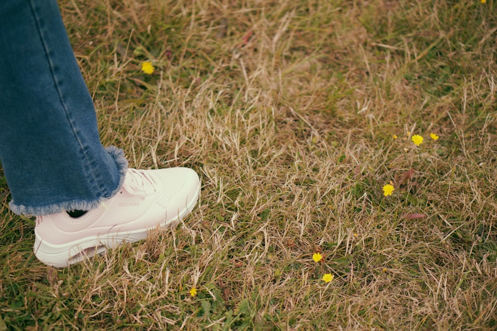 person standing on grass