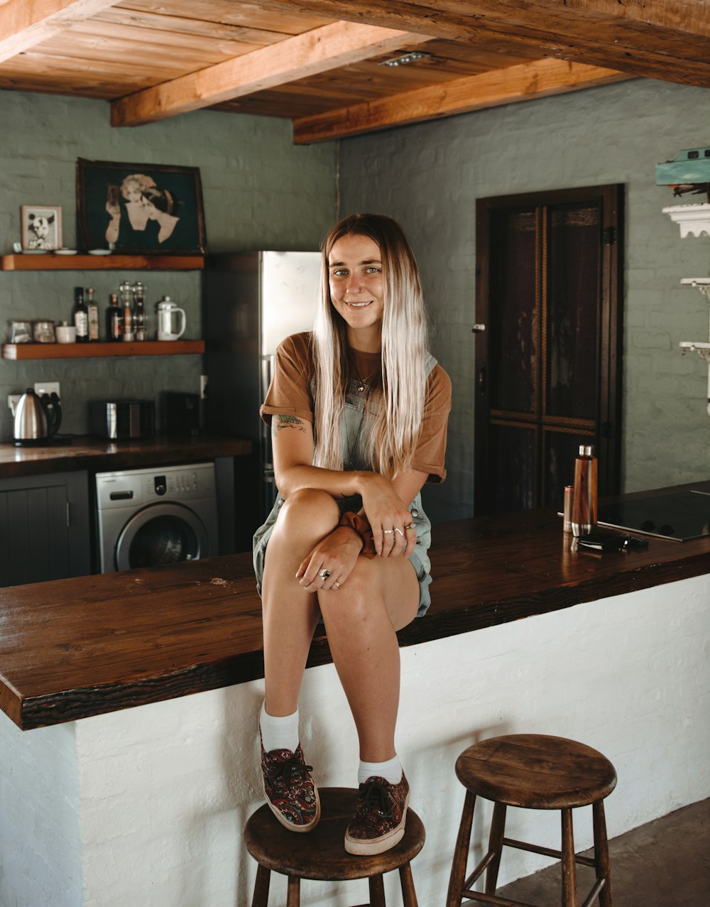 woman wooden on kitchen island