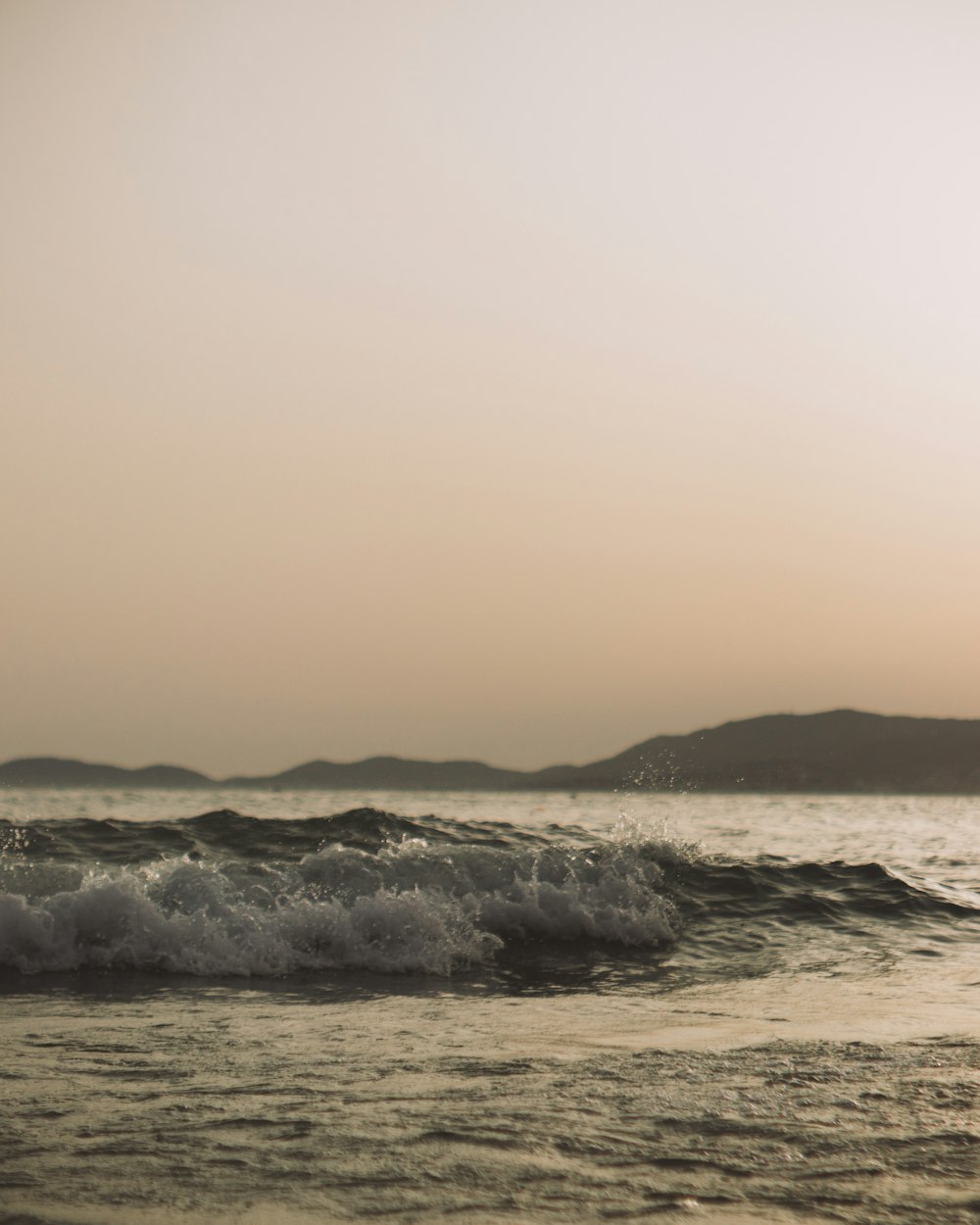 body of water during golden hour