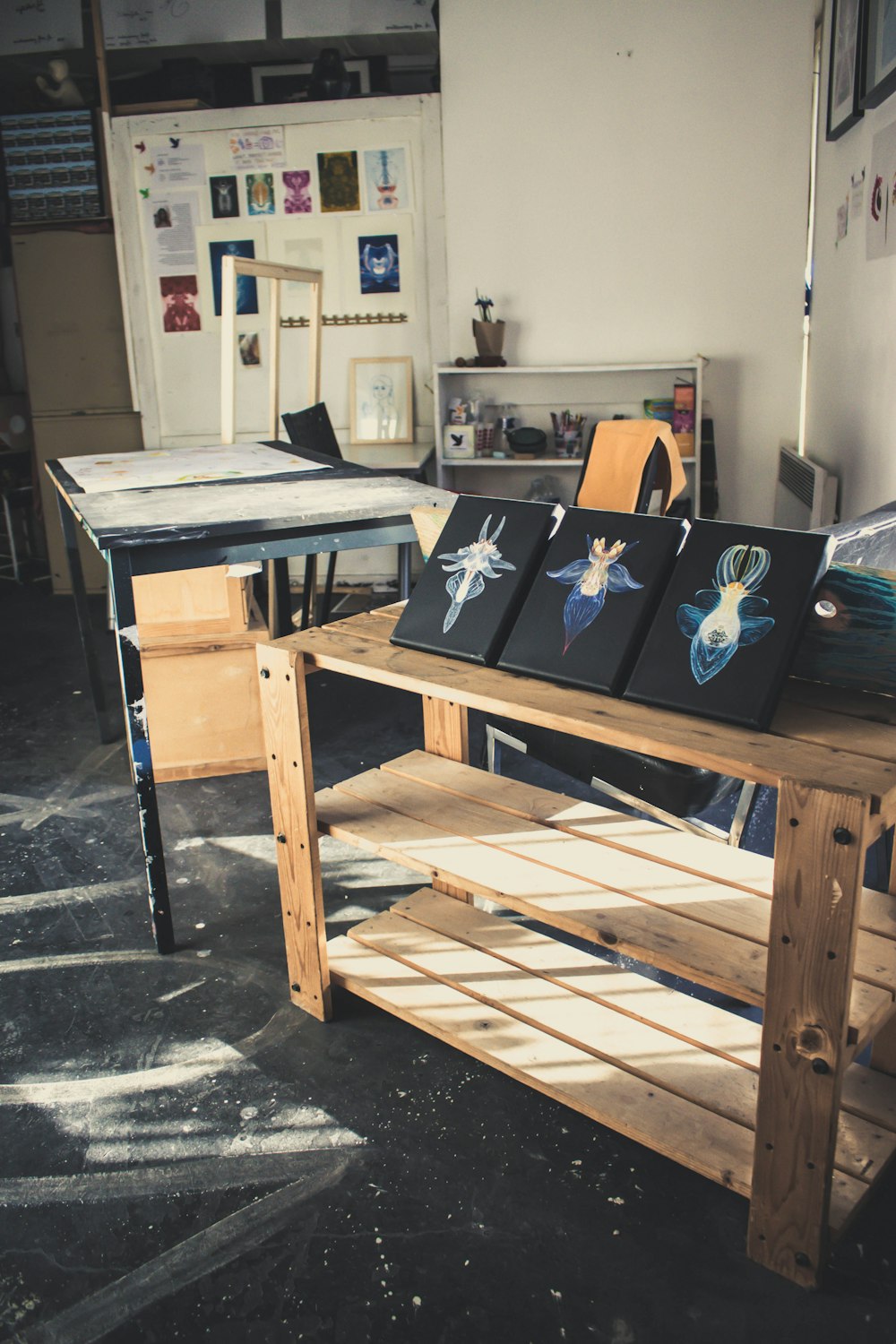 three table decors on rack