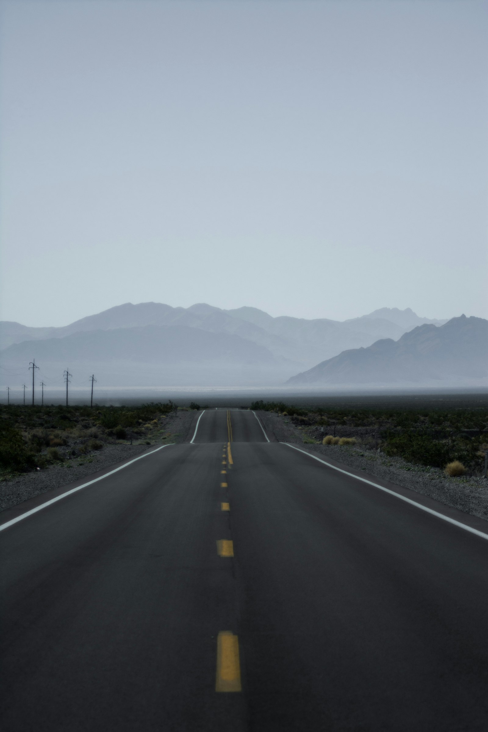 Nikon D7100 + Tamron SP 70-300mm F4-5.6 Di VC USD sample photo. Empty concrete road photography