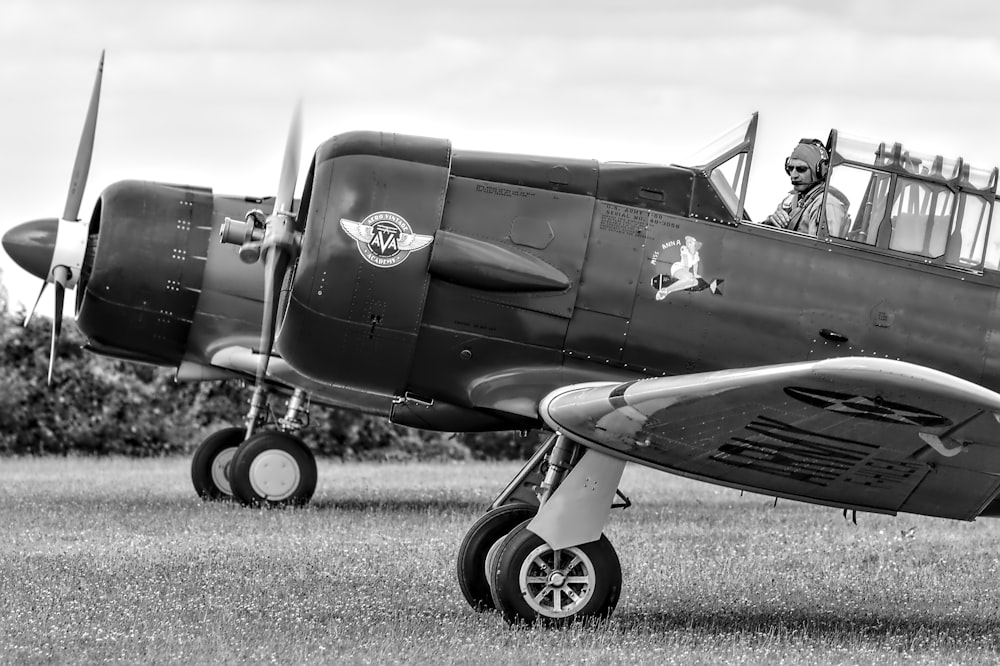 person riding on jet grayscale photography