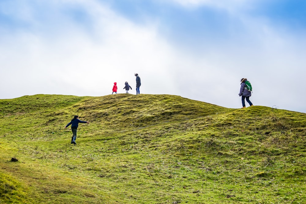 several people on mountain top