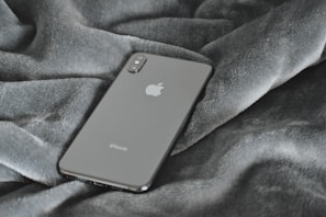 A minimalist smartphone showcasing its elegant design and features.