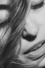 Close-up of a black and white photograph with soft lighting and simple composition.