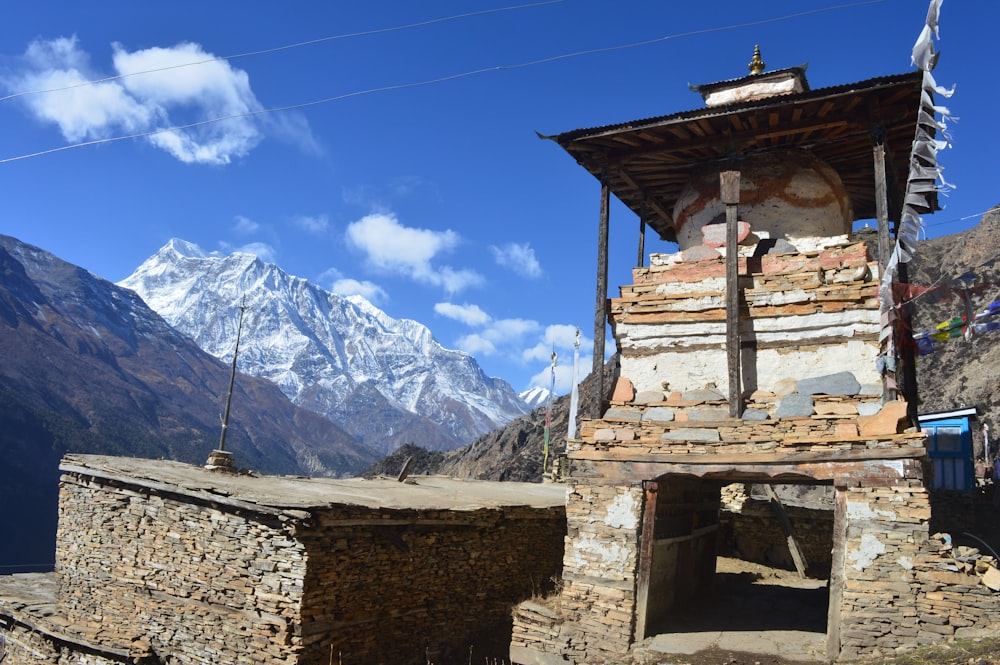 brown concrete temple at the mountain during daytime