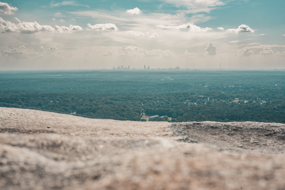 a view of a city from the top of a hill