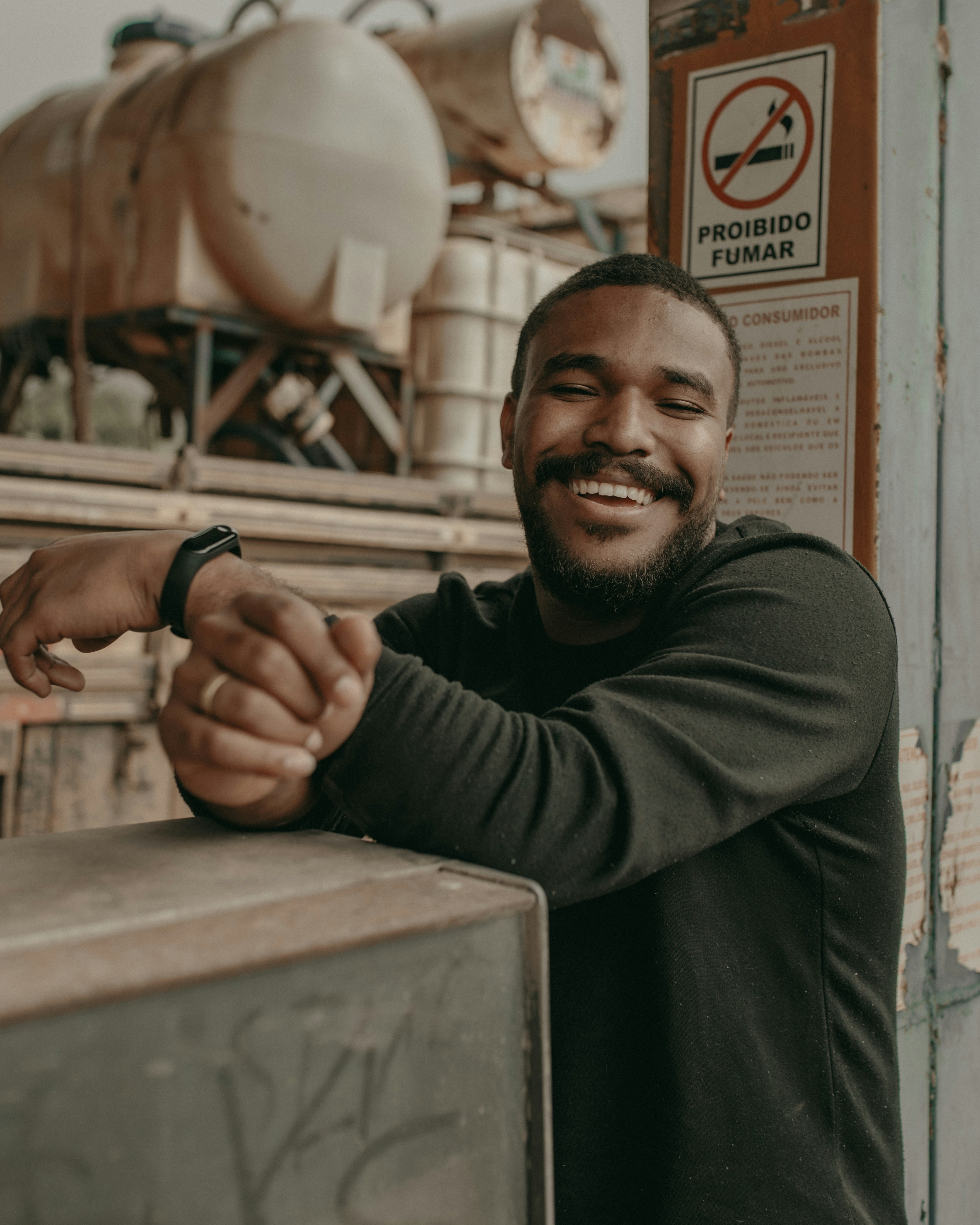 man wearing grey crew-neck sweater
