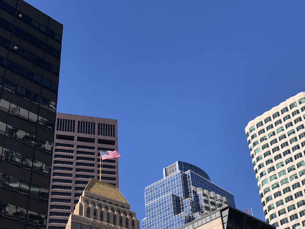 a group of tall buildings in a city