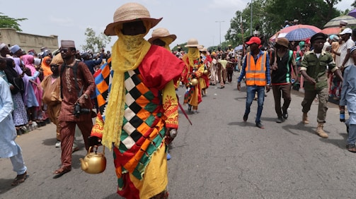 Event staff wearing vibrant, custom-printed uniforms at a festival.