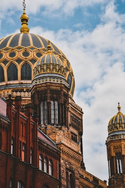 architectural photography,how to photograph yellow and black domed building during daytime