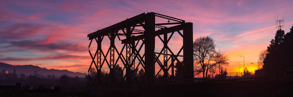 brown metal frames at sunset