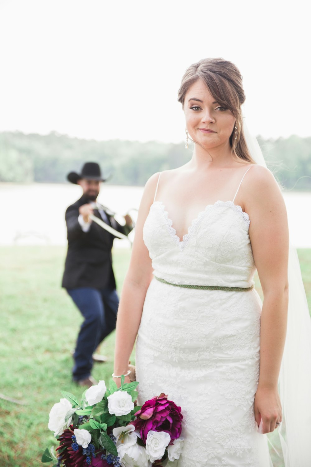woman wearing white spaghetti strap wedding dress
