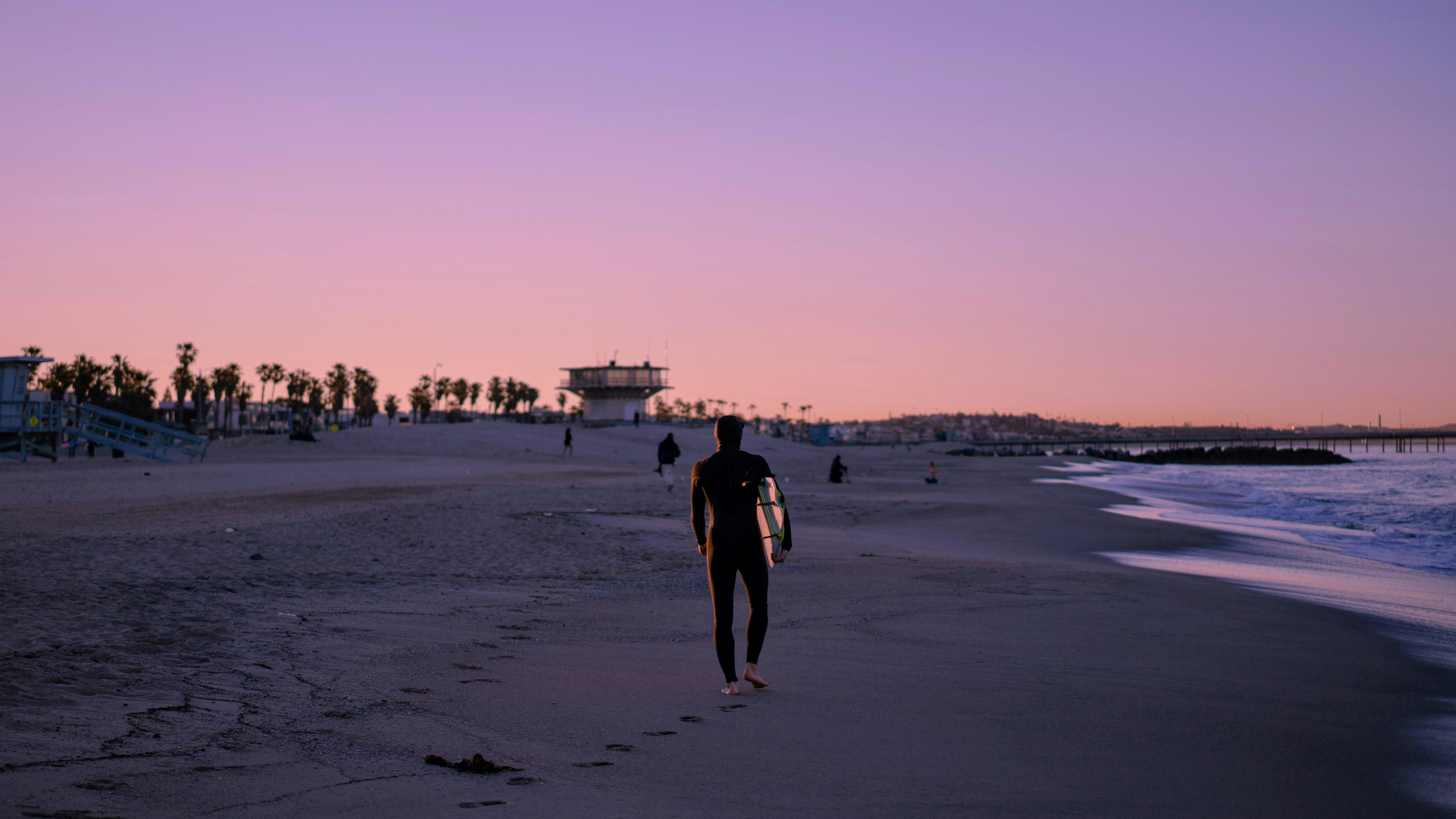 man walking on the beach