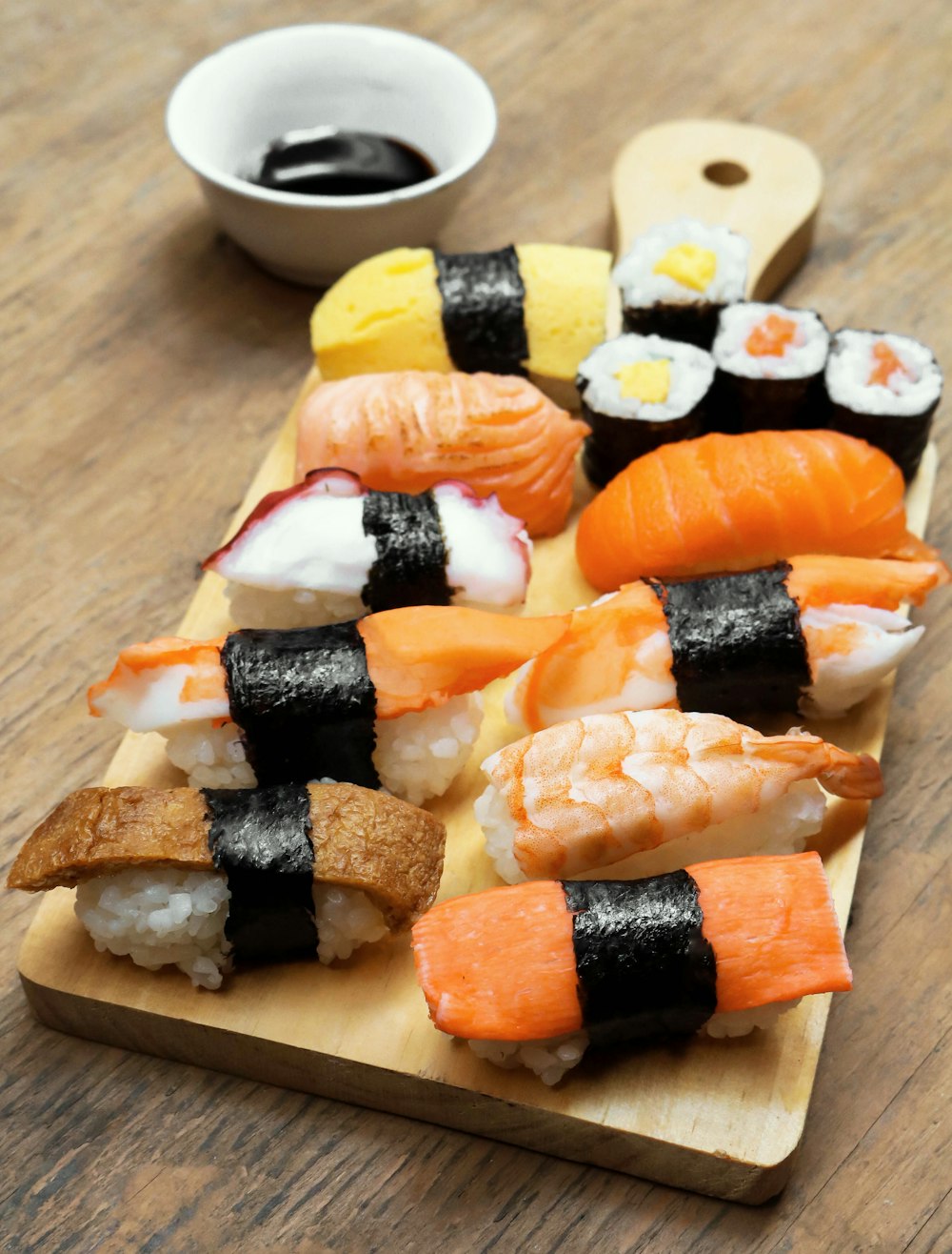 sushi on wooden platter