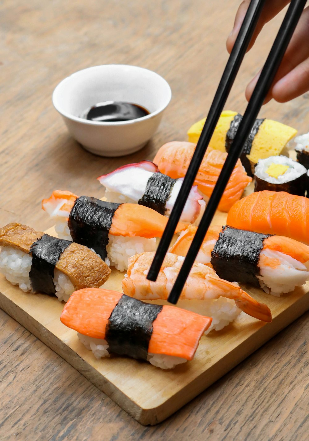 sushi on wooden tray