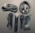 A collection of audio equipment including three microphones of different designs, several audio cables, and a black zippered pouch. The microphones feature both silver and black grills, and the cables have various connectors like XLR and quarter-inch jacks.