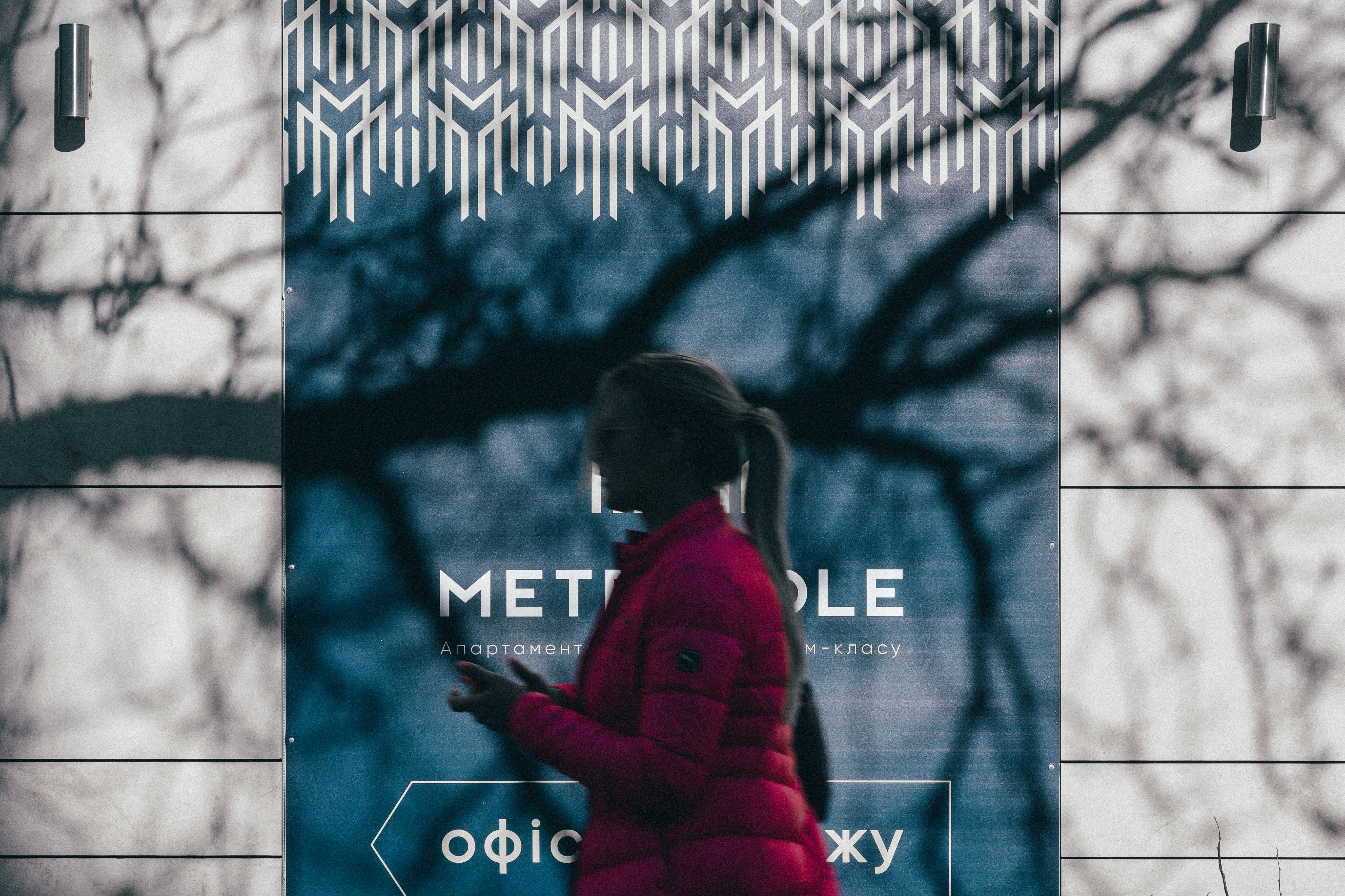 woman wearing pink bubble zip-up jacket