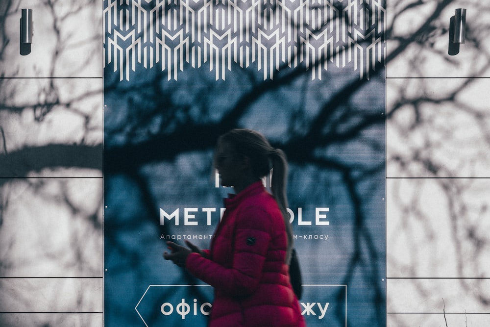 woman wearing pink bubble zip-up jacket