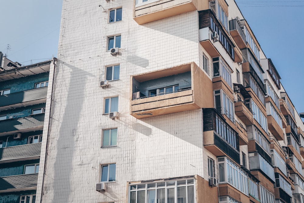 low angle photography of brown high rise building